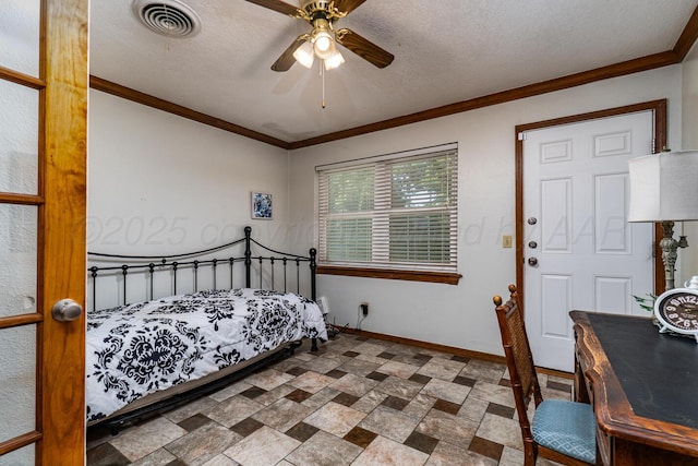 7503 Elmhurst Dr, Amarillo, TX 79121 - bedroom with ornamental molding, stone finish flooring, a ceiling fan, and a textured ceiling