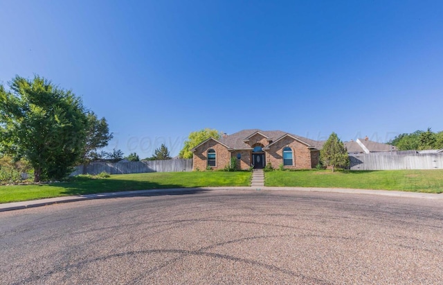 view of front of home with brick siding