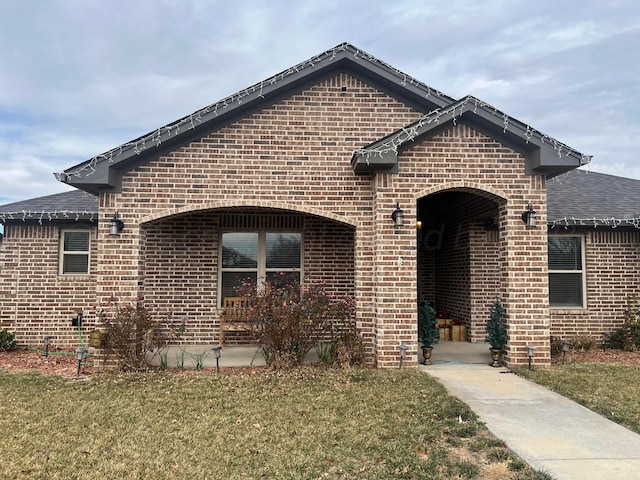 view of front of home with a front yard