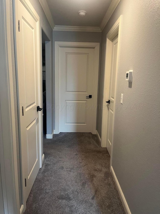 1712 NE 6th St, Dumas, TX 79020 - hall with dark colored carpet and ornamental molding