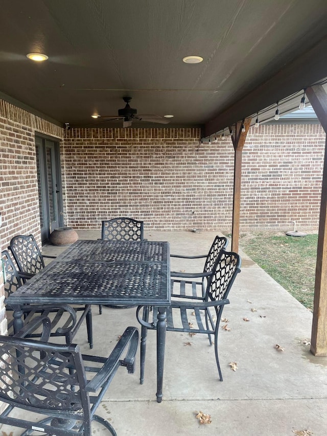 1712 NE 6th St, Dumas, TX 79020 - view of patio / terrace with a ceiling fan and outdoor dining space