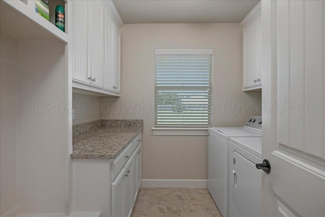 19550 Saddlehorn Rd, Amarillo, TX 79119 - washroom featuring separate washer and dryer, cabinet space, and baseboards