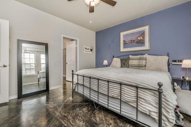 9913 Hartnett Ct, Amarillo, TX 79119 - bedroom with baseboards, finished concrete flooring, and a ceiling fan
