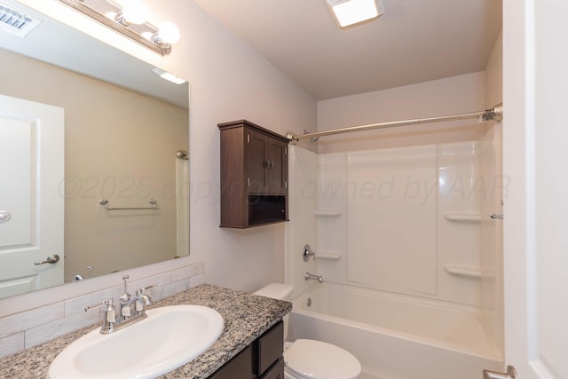 full bath with shower / bathing tub combination, visible vents, tasteful backsplash, vanity, and toilet