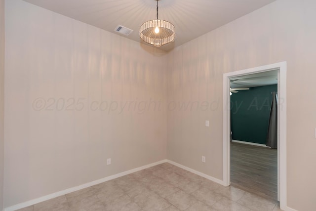 unfurnished room featuring visible vents, baseboards, and light tile patterned floors