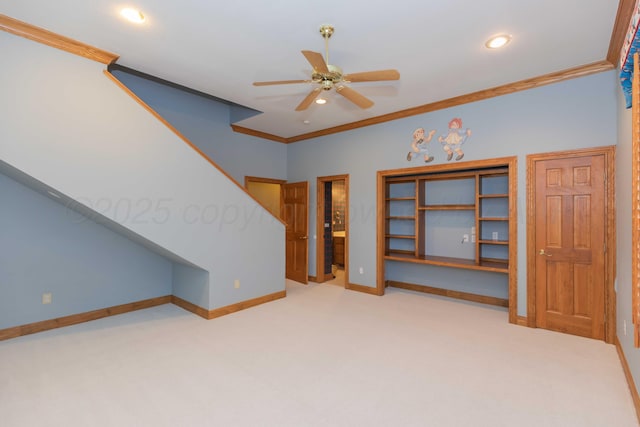 interior space with light carpet, crown molding, and ceiling fan