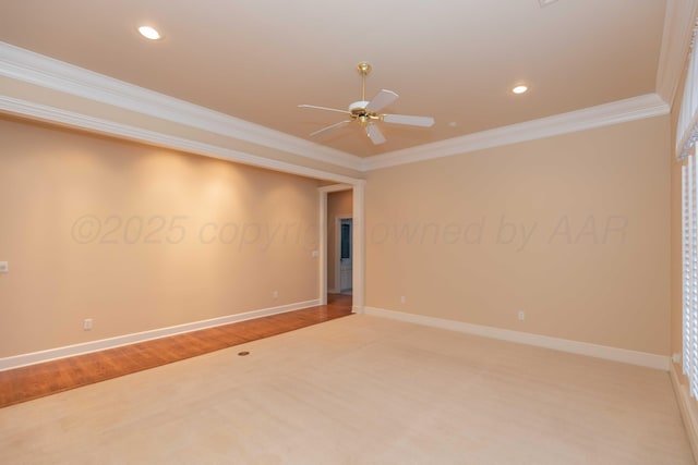 empty room with hardwood / wood-style flooring, ornamental molding, and ceiling fan