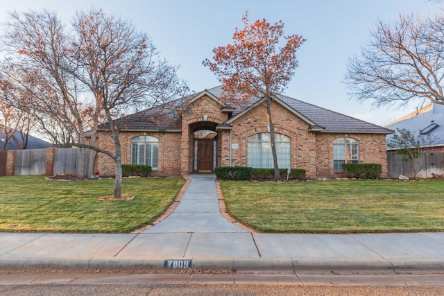 view of front of home with a front yard