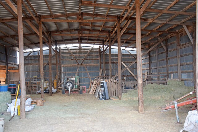 miscellaneous room featuring lofted ceiling