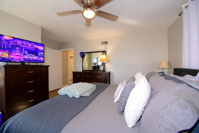 bedroom featuring ceiling fan