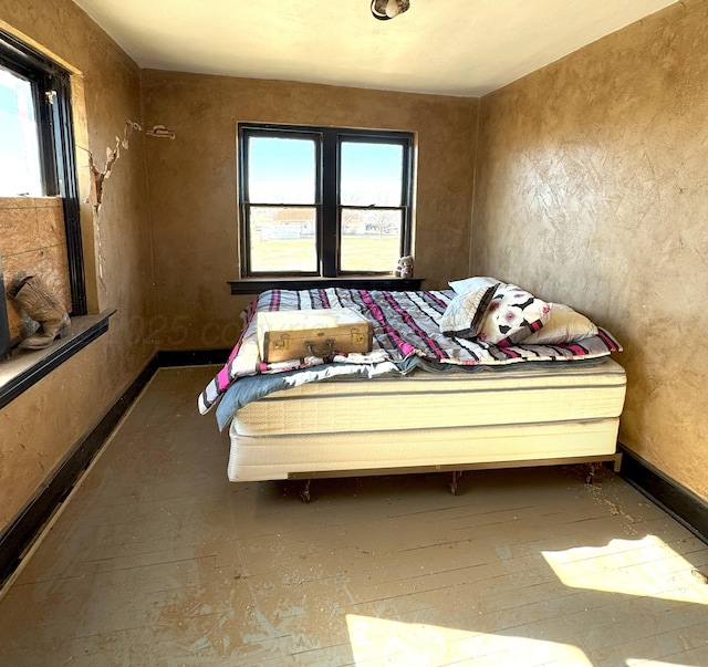 bedroom with multiple windows