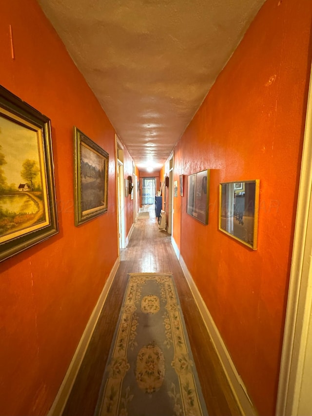 hallway featuring hardwood / wood-style floors