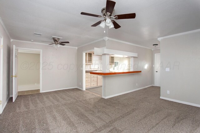 1928 Cherry St, Amarillo, TX 79106 - unfurnished living room featuring ceiling fan, crown molding, and carpet floors