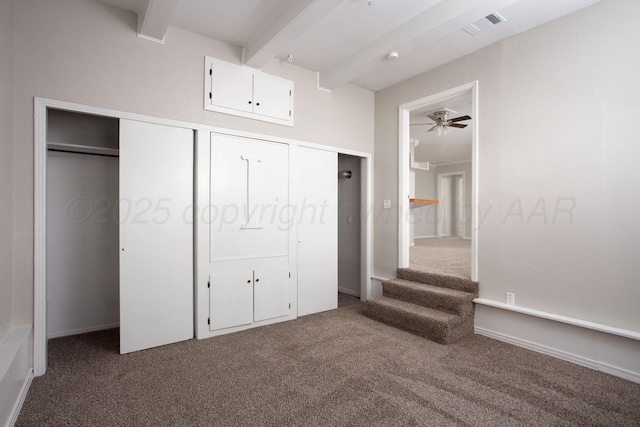 1928 Cherry St, Amarillo, TX 79106 - unfurnished bedroom with carpet flooring, beamed ceiling, and a closet