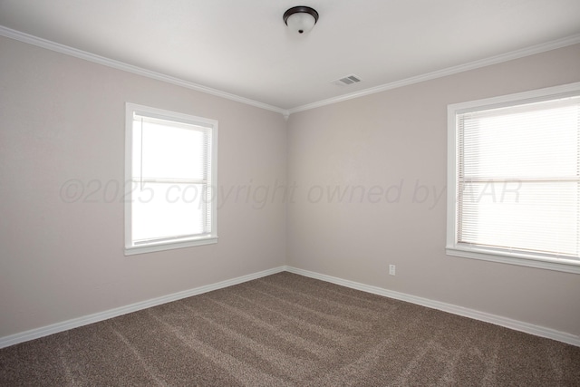 1928 Cherry St, Amarillo, TX 79106 - unfurnished room with dark colored carpet, ornamental molding, and healthy amount of natural light