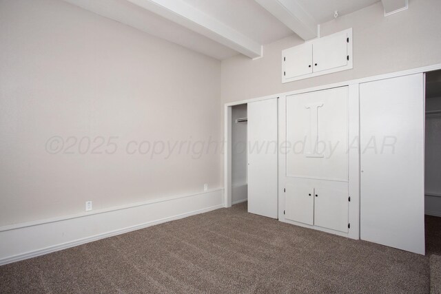 1928 Cherry St, Amarillo, TX 79106 - unfurnished bedroom featuring beam ceiling and carpet