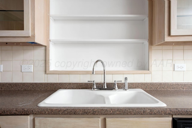 1928 Cherry St, Amarillo, TX 79106 - kitchen view of dark countertops, glass insert cabinets, open shelves, and backsplash