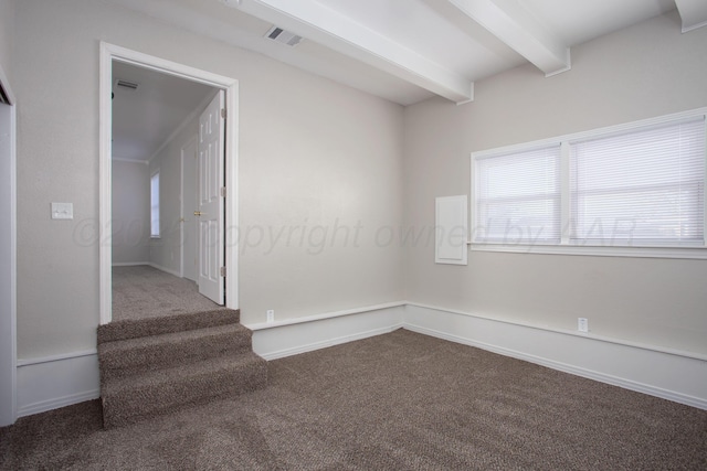 1928 Cherry St, Amarillo, TX 79106 - carpeted empty room featuring beam ceiling