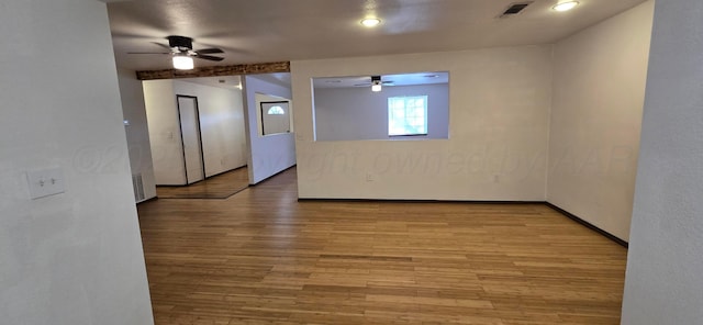 spare room featuring light hardwood / wood-style flooring