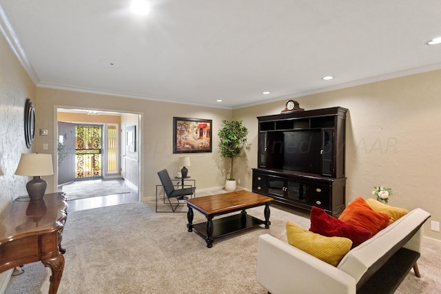 living area with light carpet, crown molding, baseboards, and recessed lighting