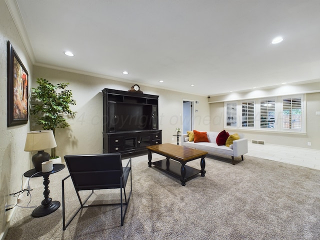 carpeted living area featuring visible vents, crown molding, and recessed lighting