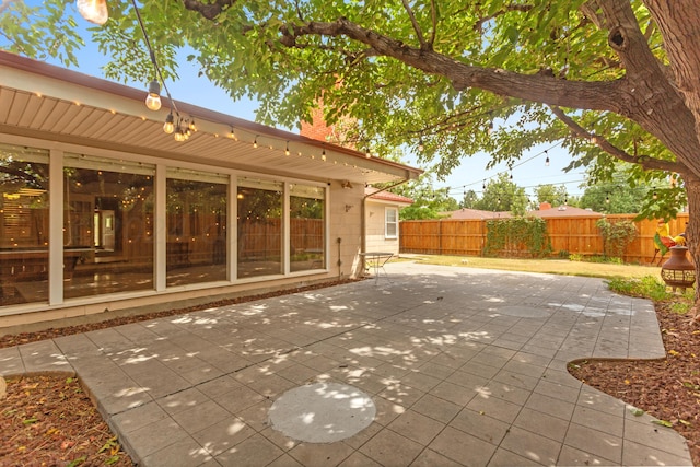 view of patio with fence