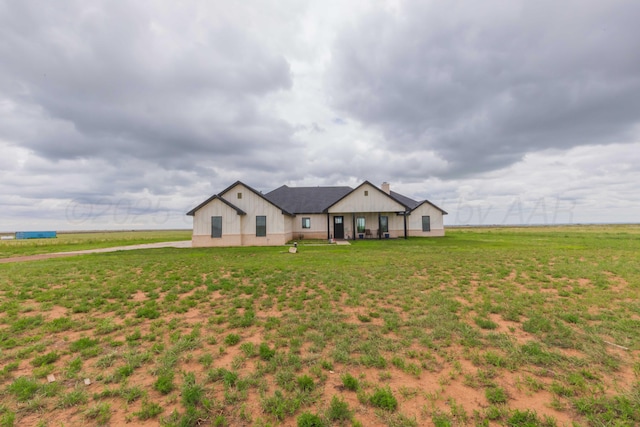 view of front of home with a front lawn