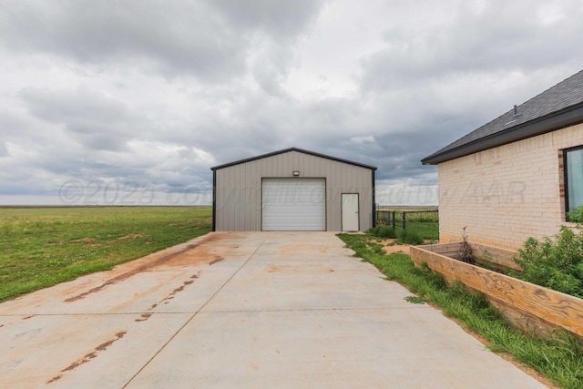 garage featuring a yard