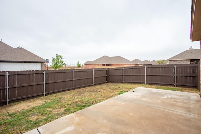9407 Kori Dr, Amarillo, TX 79119 - view of yard with a fenced backyard and a patio area