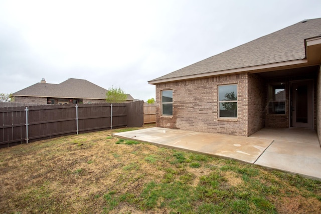 9407 Kori Dr, Amarillo, TX 79119 - view of yard with a fenced backyard and a patio area