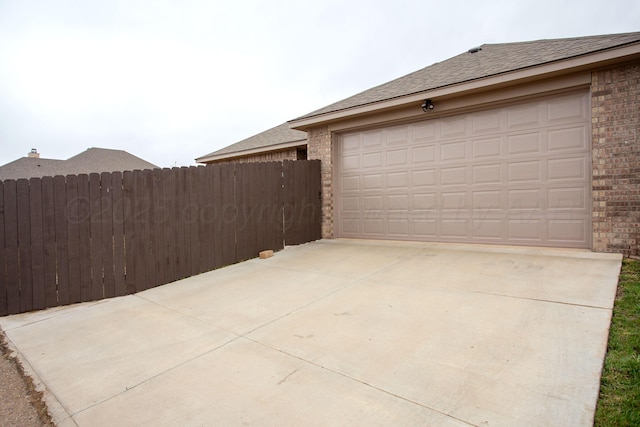 9407 Kori Dr, Amarillo, TX 79119 - garage with fence and driveway