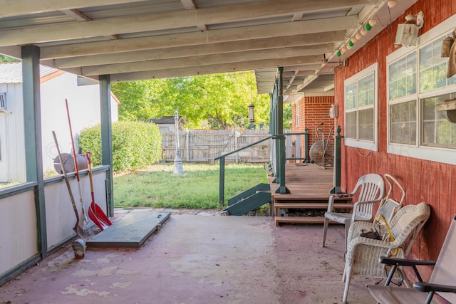 view of patio with a wooden deck