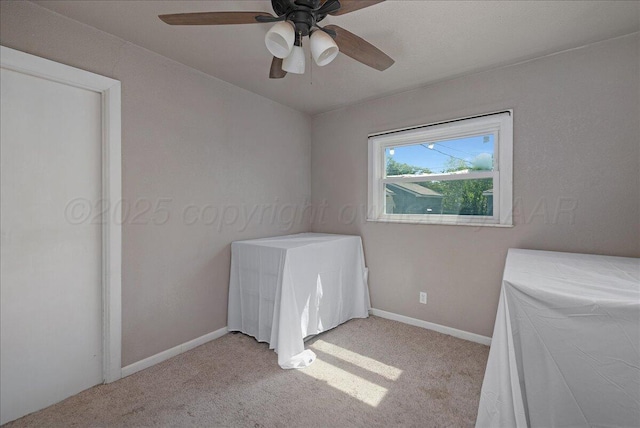 4317 Cline Rd, Amarillo, TX 79110 - unfurnished bedroom featuring light carpet, baseboards, and ceiling fan