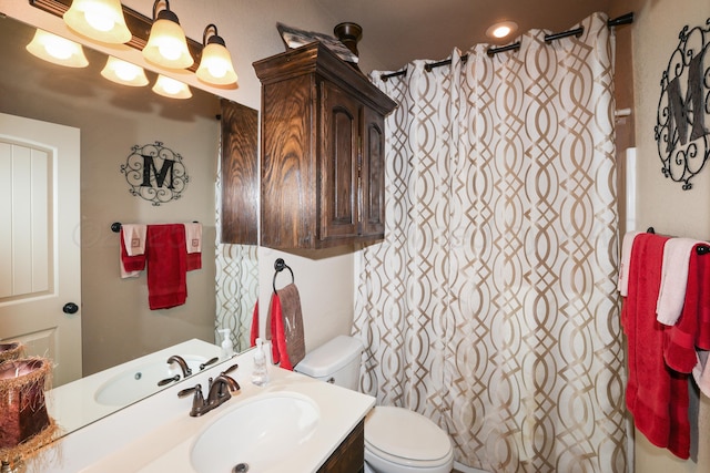18150 19th St, Amarillo, TX 79124 - bathroom with toilet, vanity, and a shower with curtain