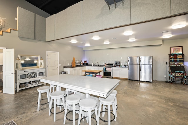 18150 19th St, Amarillo, TX 79124 - dining room with concrete floors and a high ceiling