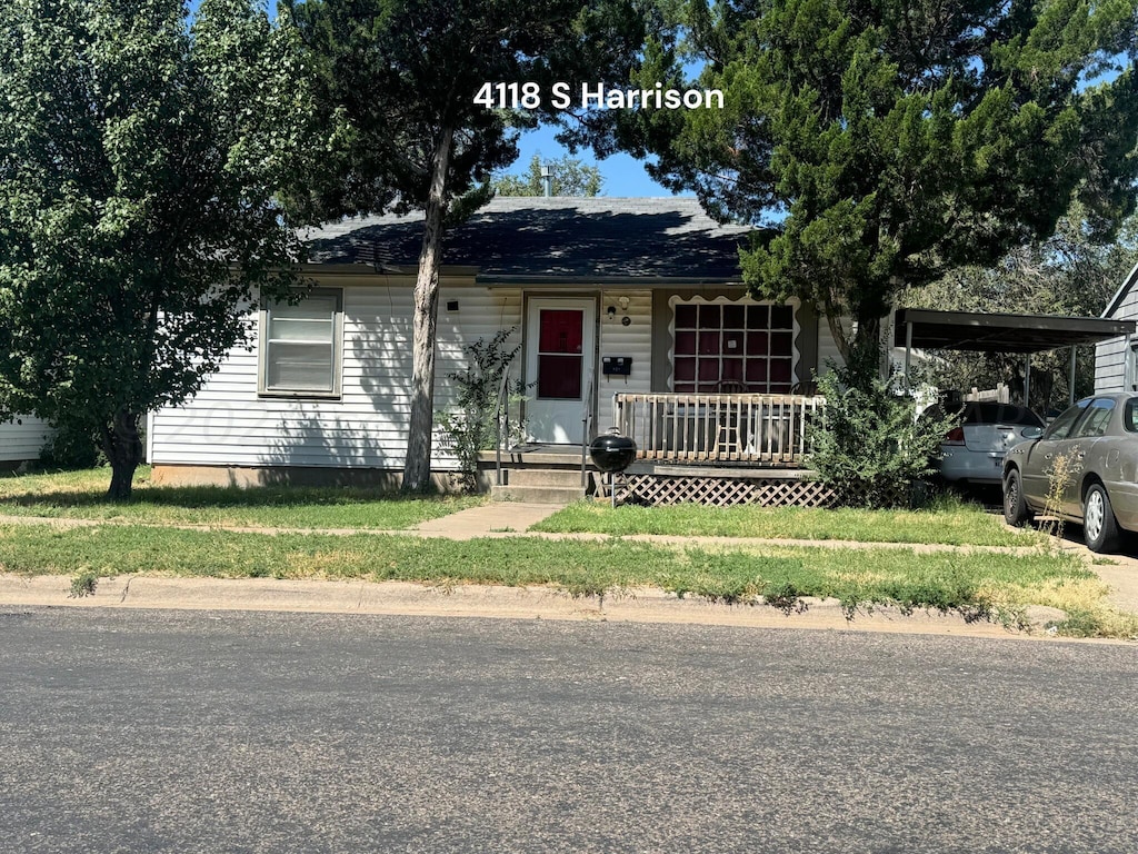 4118 S Harrison St, Amarillo, TX 79110 - view of front of home with a porch and an attached carport