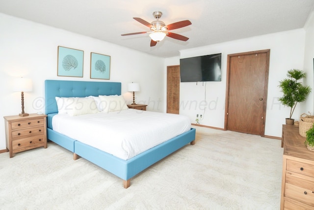 6108 Belpree Rd, Amarillo, TX 79106 - carpeted bedroom with ceiling fan and two closets