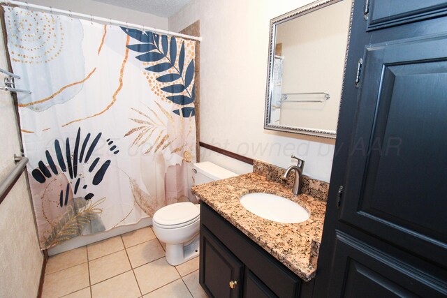 6108 Belpree Rd, Amarillo, TX 79106 - bathroom featuring tile patterned flooring, vanity, and curtained shower