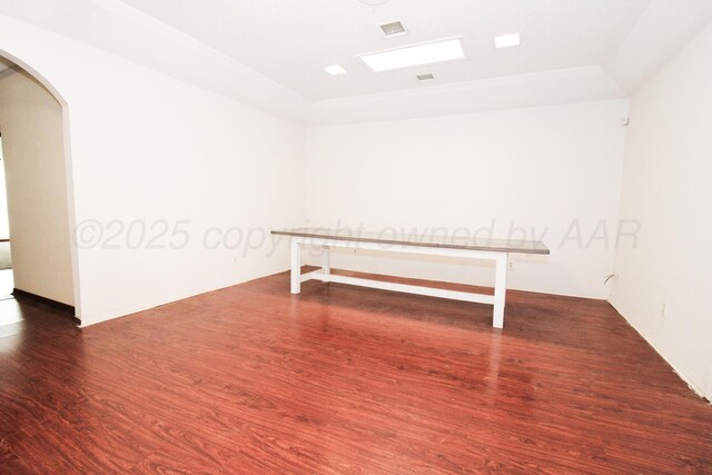 6108 Belpree Rd, Amarillo, TX 79106 - unfurnished room with arched walkways and wood finished floors