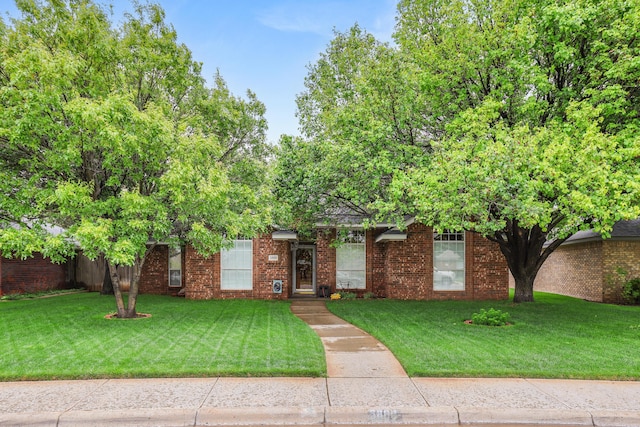 5809 Foxcroft Dr, Amarillo, TX 79109 - view of front of property featuring a front lawn and brick siding