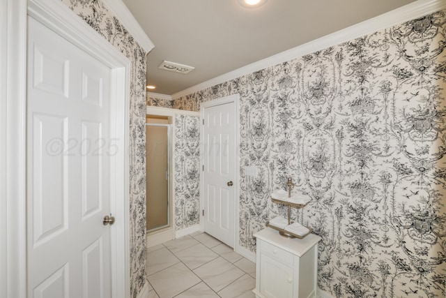 5809 Foxcroft Dr, Amarillo, TX 79109 - bathroom with a stall shower, crown molding, marble look tiles, and wallpapered walls