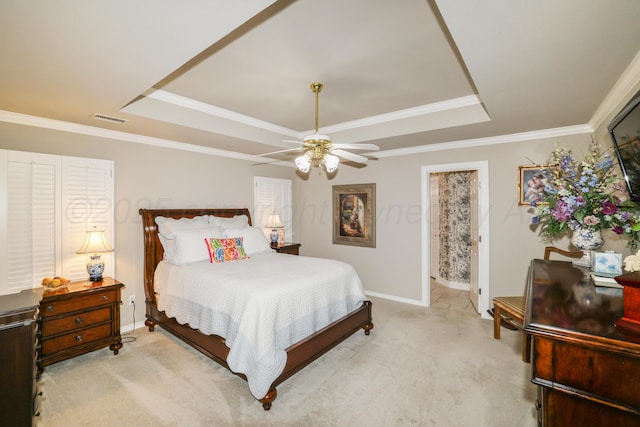 5809 Foxcroft Dr, Amarillo, TX 79109 - bedroom featuring a tray ceiling, light carpet, baseboards, ornamental molding, and ceiling fan