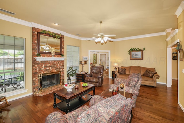 5809 Foxcroft Dr, Amarillo, TX 79109 - living room with ceiling fan, crown molding, a brick fireplace, wood-type flooring, and baseboards