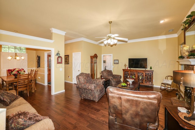 5809 Foxcroft Dr, Amarillo, TX 79109 - living area featuring a ceiling fan, baseboards, wood-type flooring, ornamental molding, and a chandelier