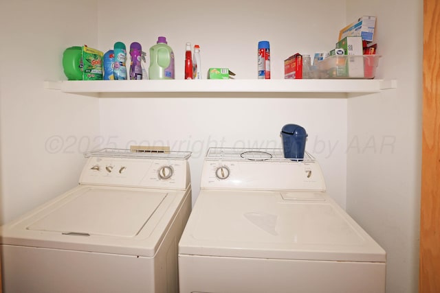 washroom featuring washer and dryer