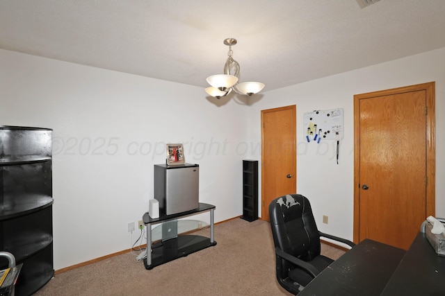 carpeted office space featuring baseboards
