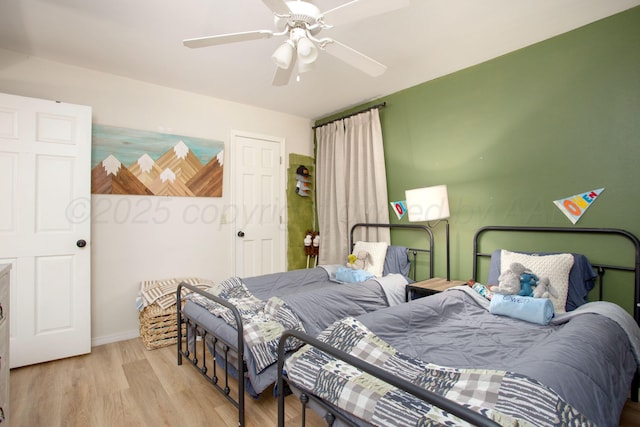 6010 Calumet Rd, Amarillo, TX 79106 - bedroom with light wood-style flooring and ceiling fan