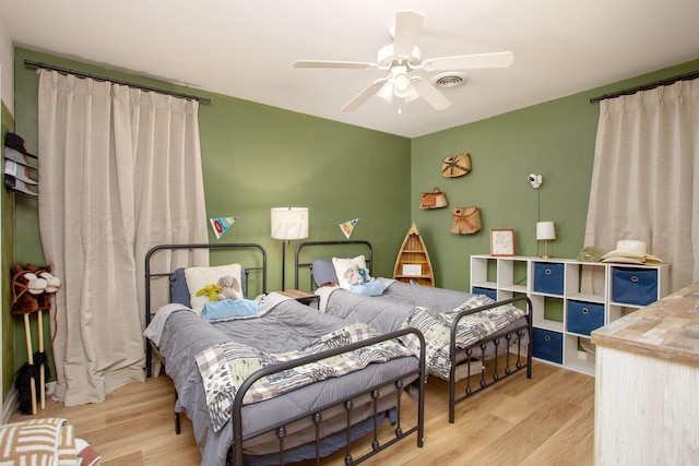 6010 Calumet Rd, Amarillo, TX 79106 - bedroom featuring wood finished floors and a ceiling fan