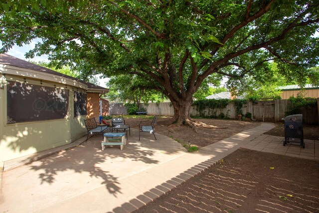 6010 Calumet Rd, Amarillo, TX 79106 - fenced backyard with a patio