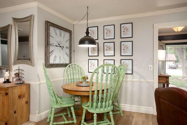 6010 Calumet Rd, Amarillo, TX 79106 - dining area featuring wood finished floors and ornamental molding